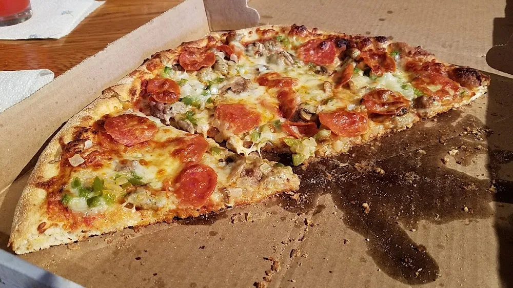 Large One Topping Pizza with Four 20oz Drinks